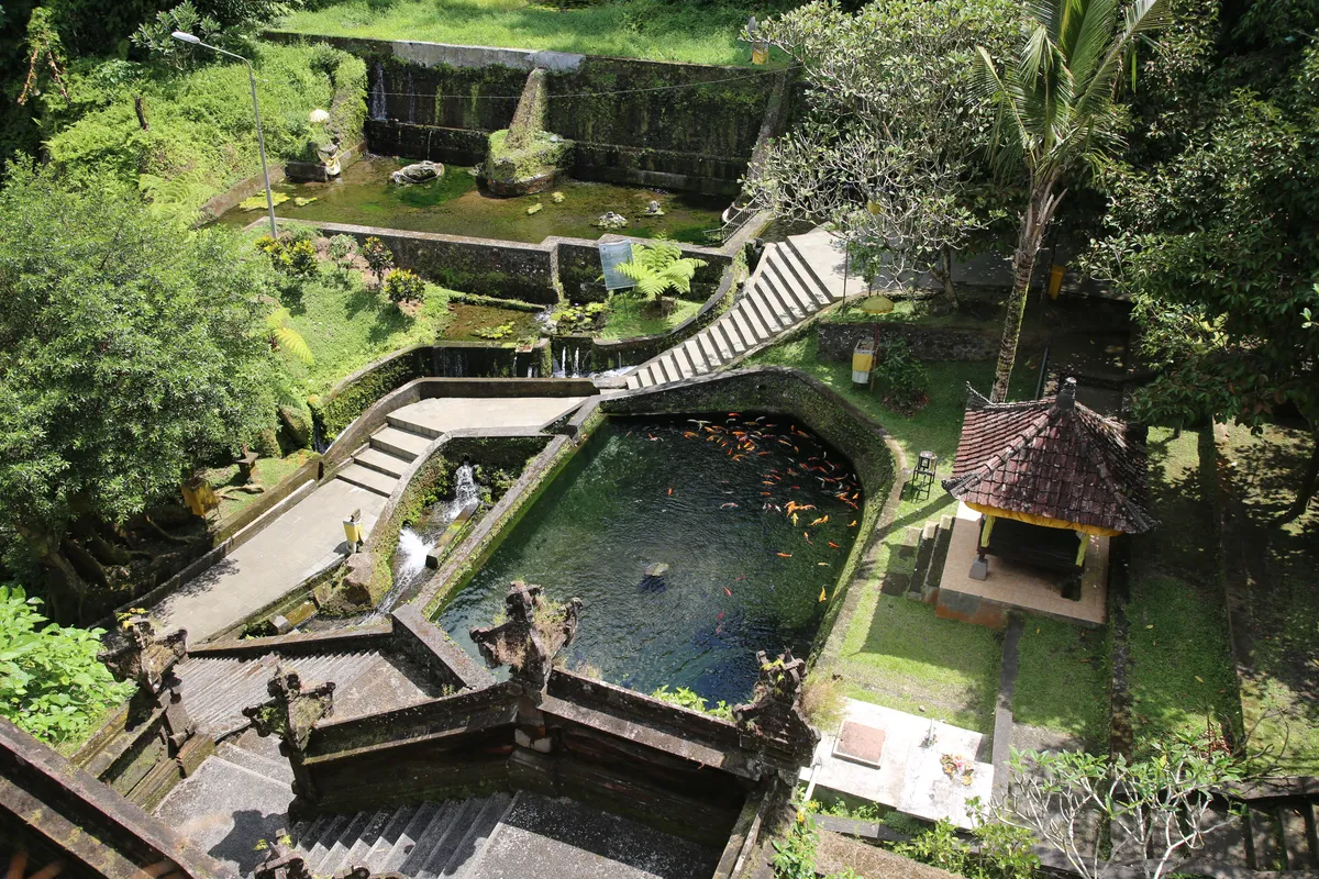 Lush tropical garden surrounding the sacred water temple