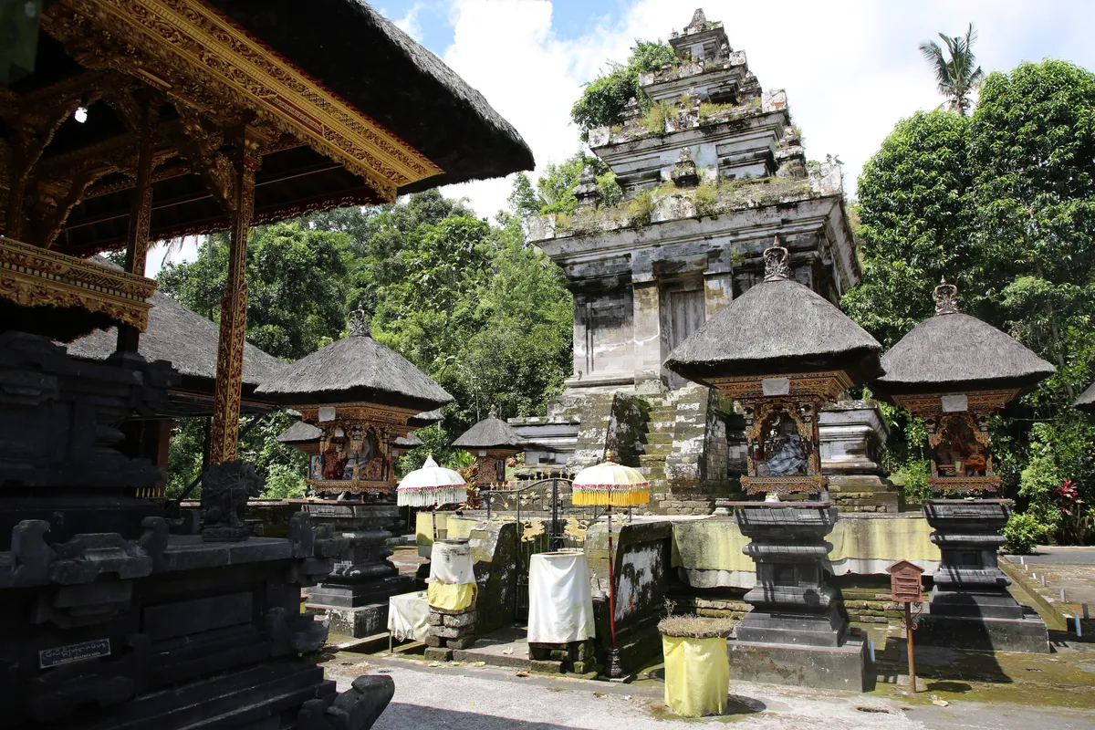Participant bathing in the sacred temple springs during ceremony